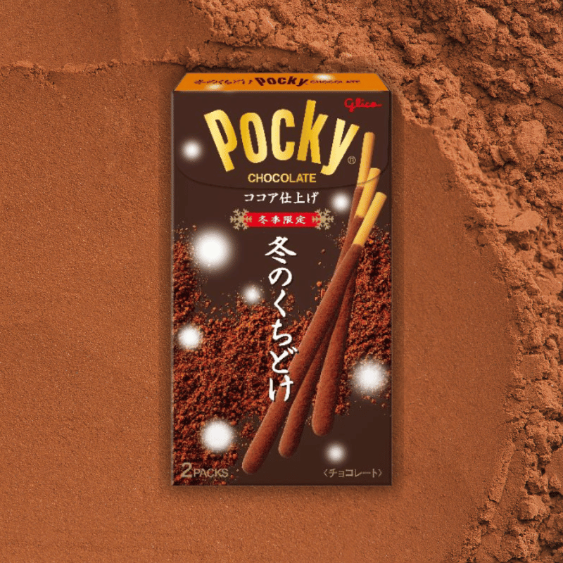 Pocky Winter Melty package on cocoa powder background